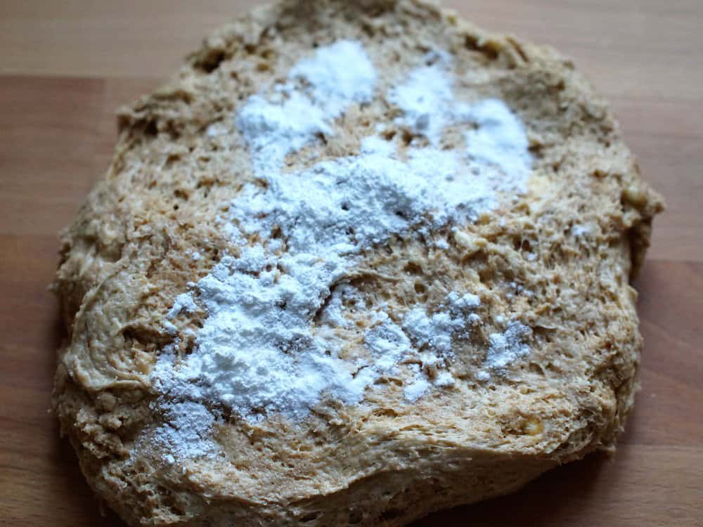 closeup of Lemon Raspberry Sourdough Sweet Rolls dough with baking powder sprinkled on top