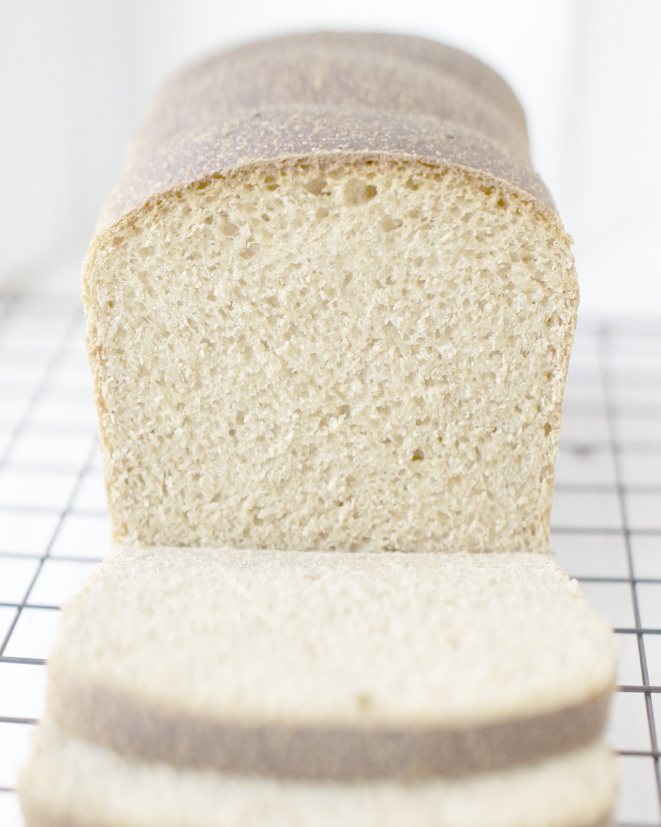 frontal crumb shot of Wheat and Einkorn Sandwich Bread showcasing the soft, whole wheat crumb