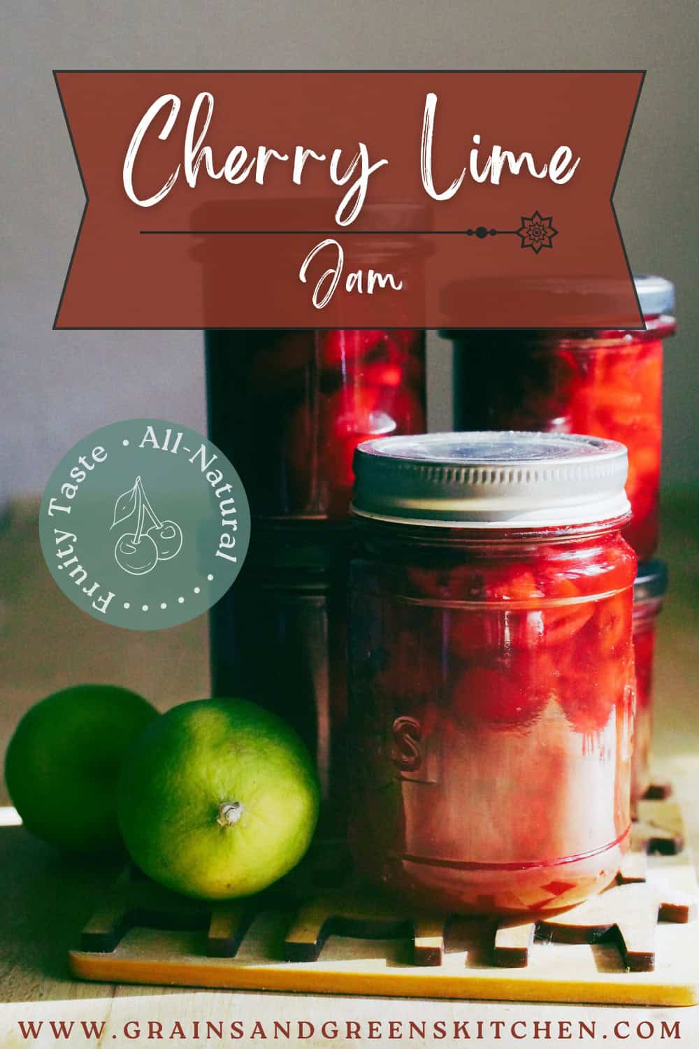 Jars full of vibrant cherry lime jam shining in golden sunlight. Jars sit on a wooden caster along with the green limes.